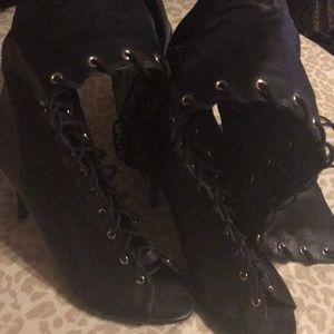 Thigh high lace up stiletto boots